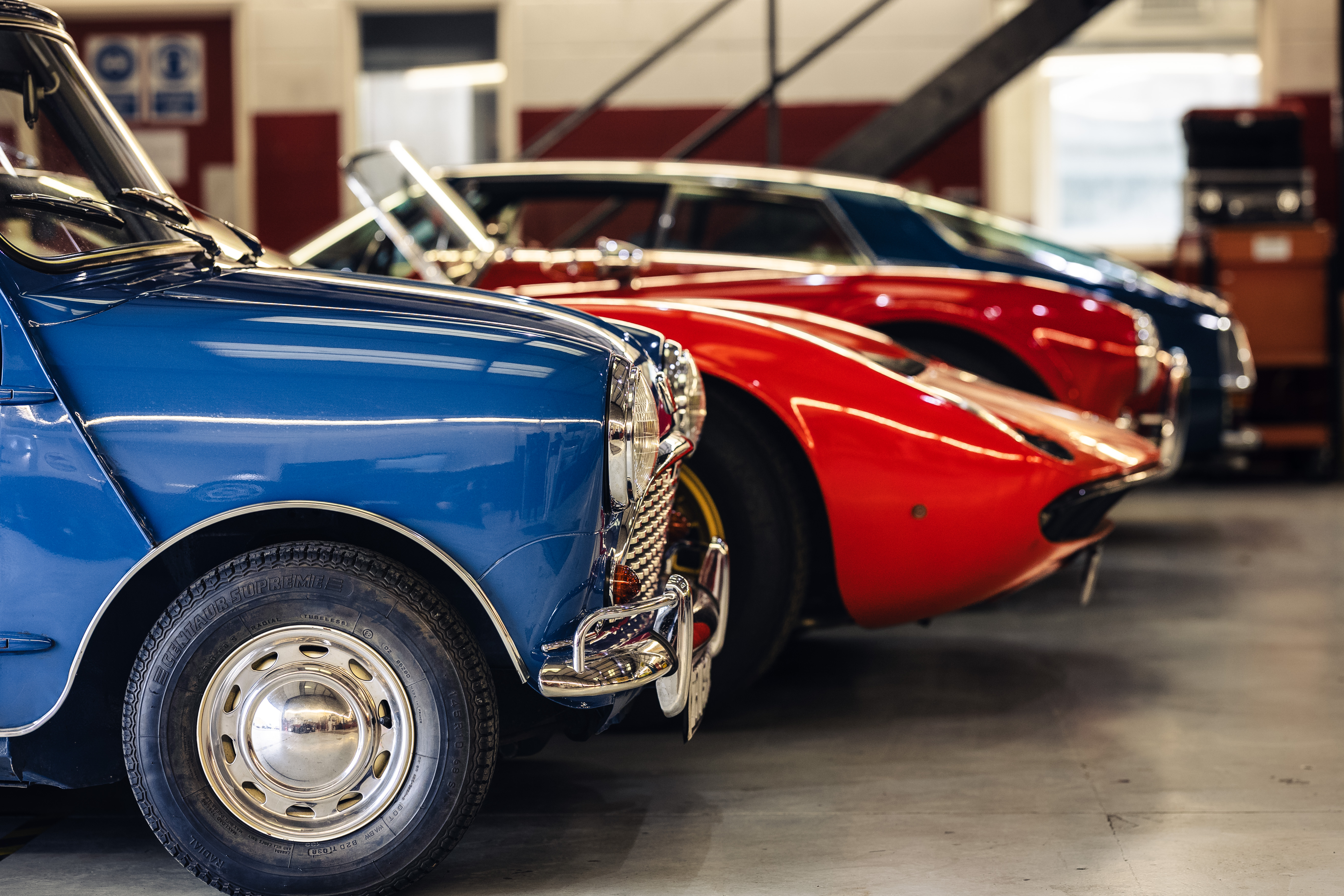 Mini and cars in row at Haynes Heritage Engineering Workshop